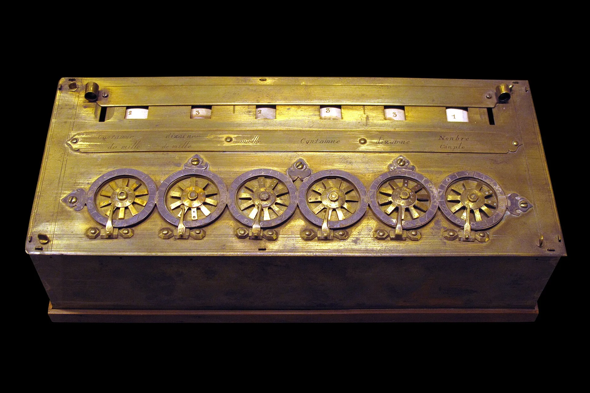 Pascal's brass calculating machine with a row of dials